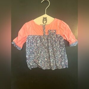 18 month Levi’s pink and blue floral three button shirt. Great condition.